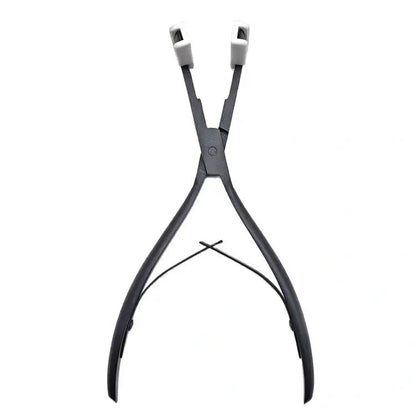 Close-up of professional stainless steel Tape-In pliers